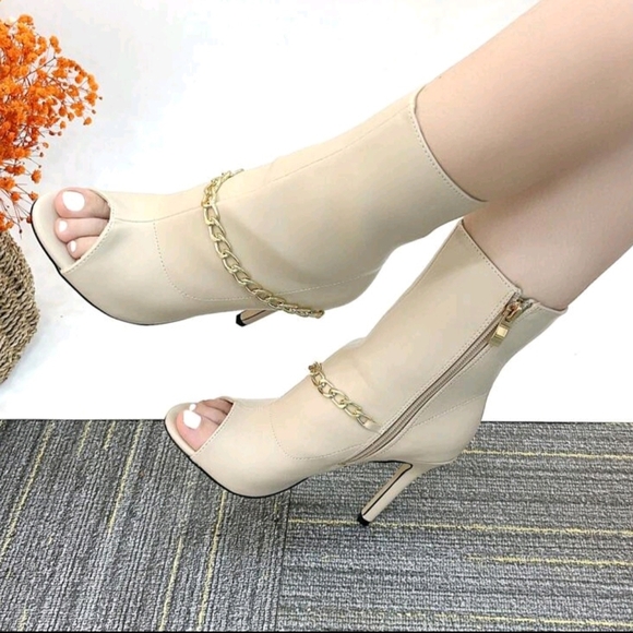 Sleek Black Peep-Toe Heeled Boots with Gold Chain - Picture 8 of 13